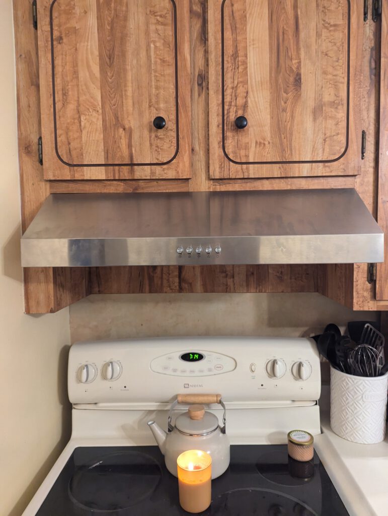 Silver vent range over stove