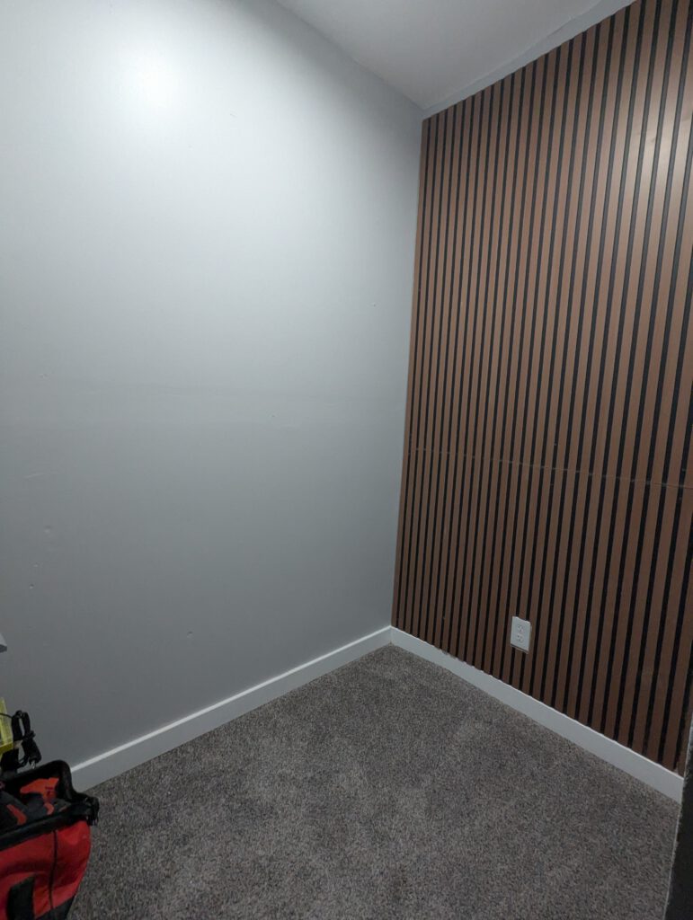 Finished closet with wall slats