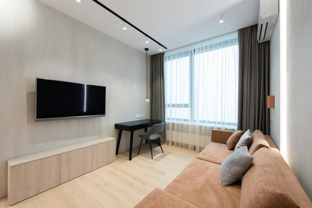 Flatscreen TV hanged on modern wall