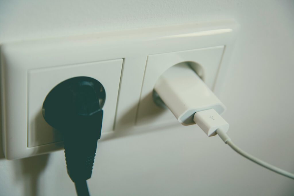 Wall outlet with two plus on it