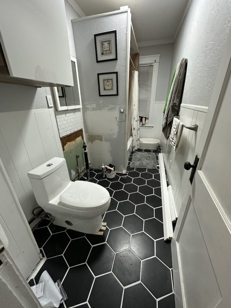 black hexigon bathroom tiles